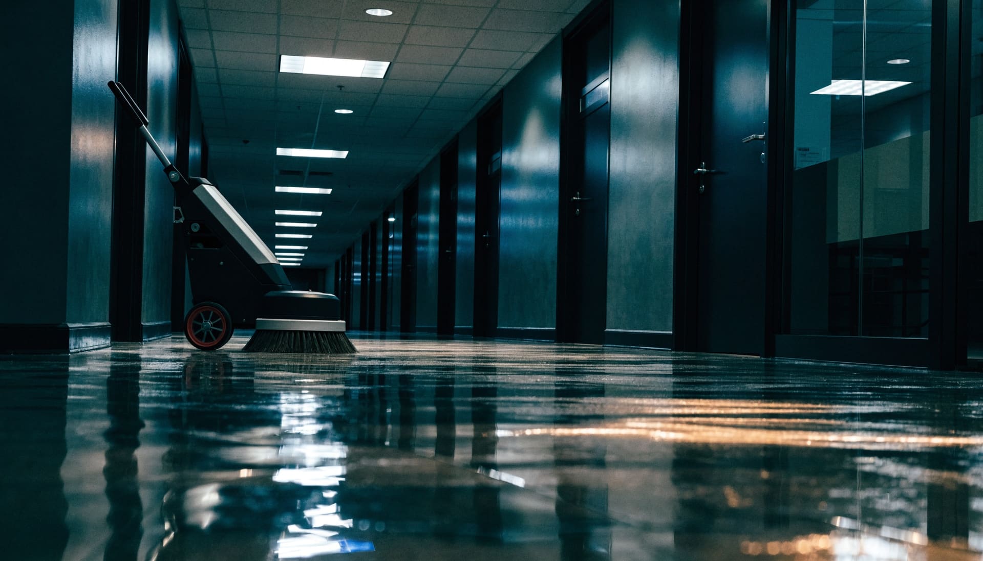A freshly waxed vinyl tile floor in an office corridor (representative image)
