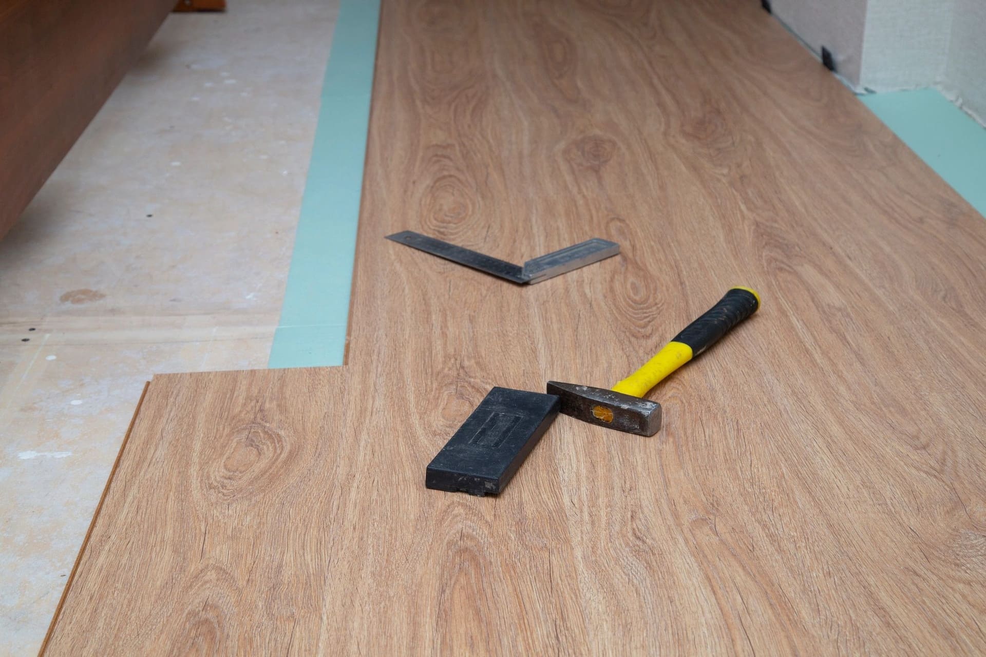 Laminate flooring being installed