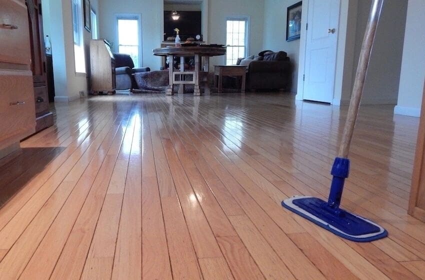 A freshly cleaned hardwood floor in a home, cleaned by ASJ